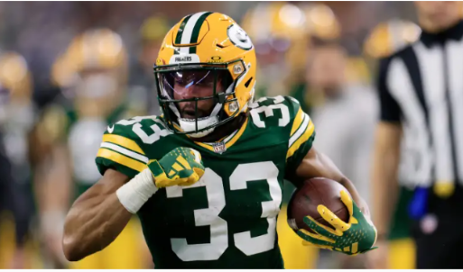 “Aaron Jones Leads Packers to Playoff Victory Over Cowboys”