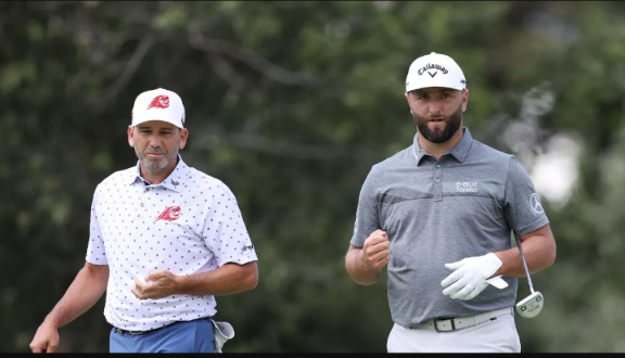 Jon Rahm’s caddie Adam Hayes gets struck in the face at The Open