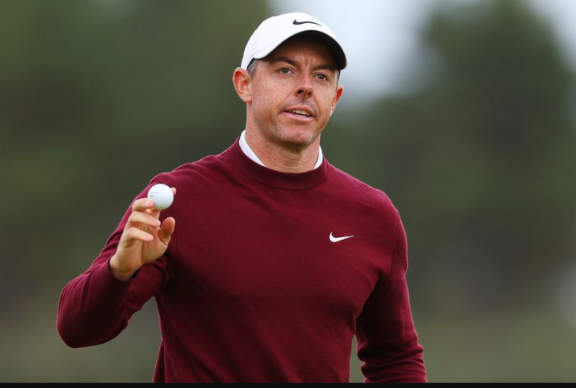 Rory McIlroy accidentally hits himself in the face with club as he fails to make Open cut