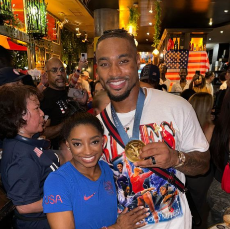 Simone Biles defends husband after he wore her Olympic gold medal