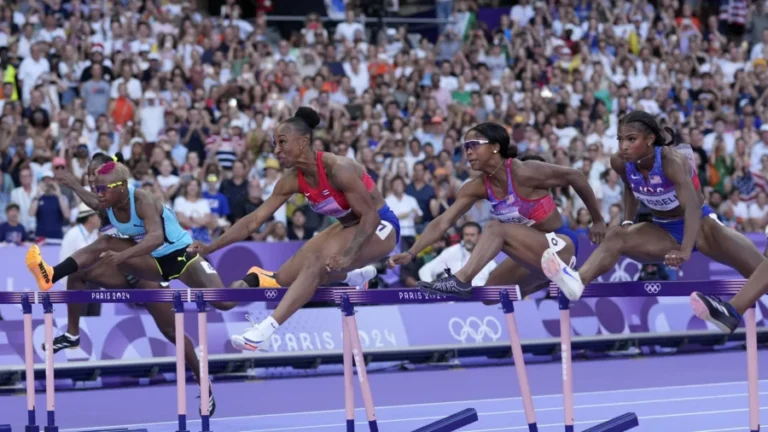 America’s Masai Russell Wins Thrilling Photo Finish in Women’s 100-Meter Hurdles, Samba-Mayela Claims Silver for France