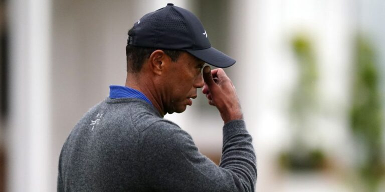 Tiger Woods cuts frustrated figure after 79 leaves him fighting to make Open cut