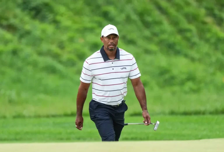 Tiger Woods to pro golfer on Masters debut: “Wanna slide down this hill?”